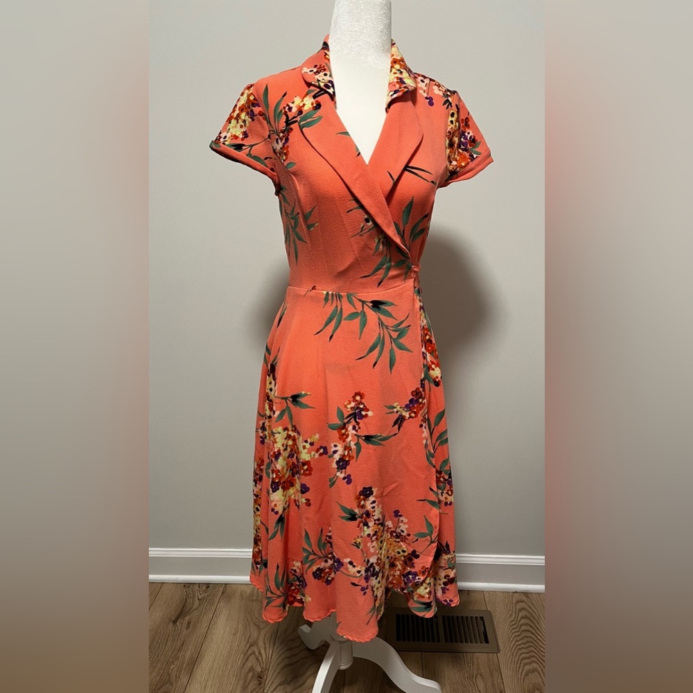 Salmon pink shortsleeve wrap dress with floral print